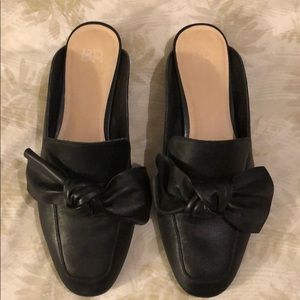 B.P. Mast black leather mules.